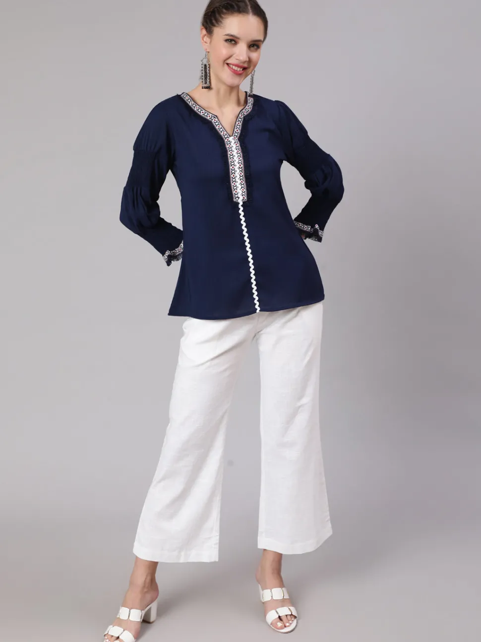 Jaipur Kurti A Blue Poly Silk Lace Embellished Top With Smocked Sleeves With Wide-Leg White Pants