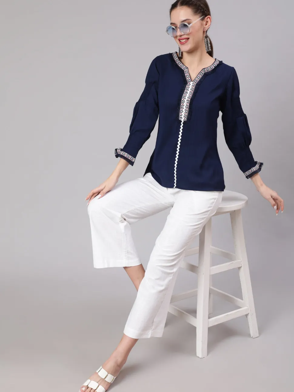 Jaipur Kurti A Blue Poly Silk Lace Embellished Top With Smocked Sleeves With Wide-Leg White Pants