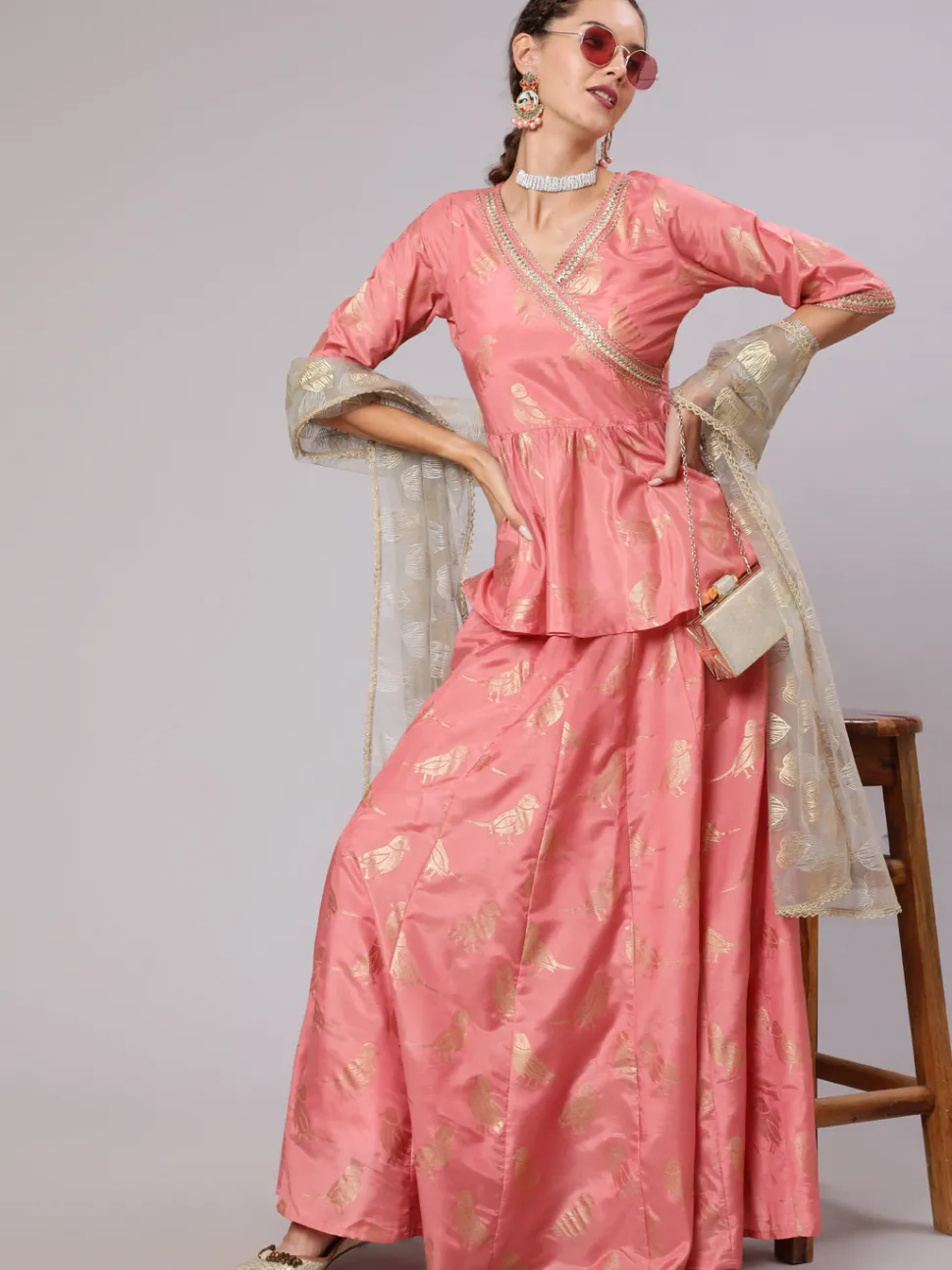 Jaipur Kurti A Peach Color Bird Printed Silk Blend Peplum Top And Skirt With A Gold Print Net Dupatta