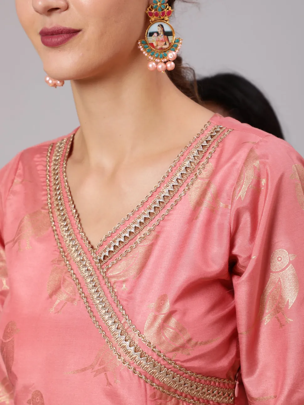 Jaipur Kurti A Peach Color Bird Printed Silk Blend Peplum Top And Skirt With A Gold Print Net Dupatta