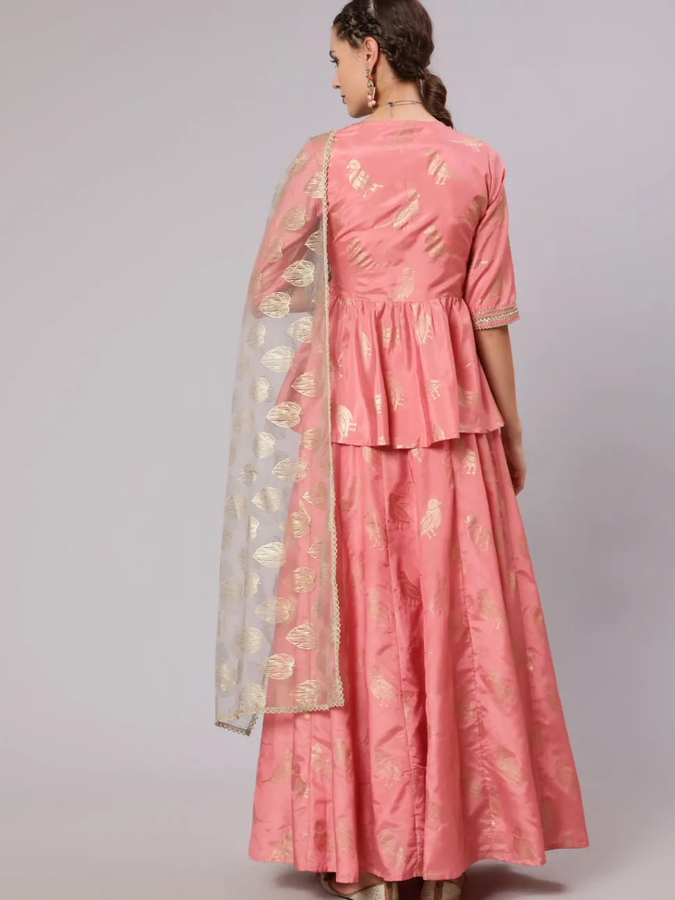 Jaipur Kurti A Peach Color Bird Printed Silk Blend Peplum Top And Skirt With A Gold Print Net Dupatta