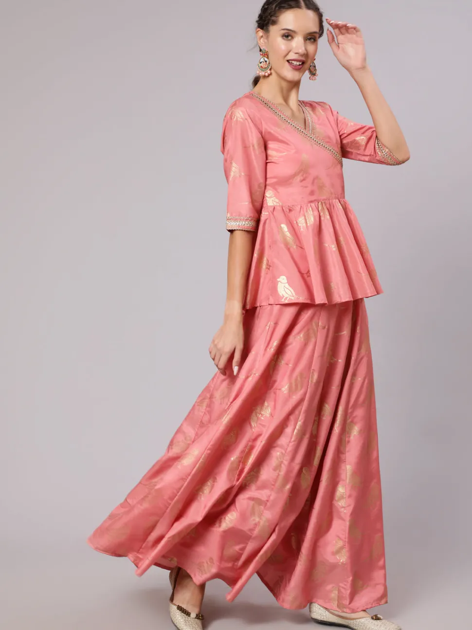 Jaipur Kurti A Peach Color Bird Printed Silk Blend Peplum Top And Skirt With A Gold Print Net Dupatta